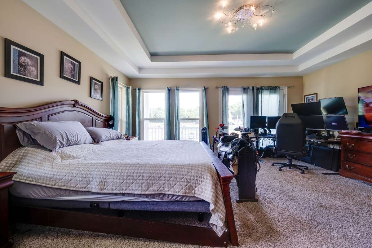 This master bedroom is large enough for a home office.