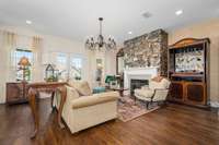 Open living room with french doors to your covered patio.  An electric fireplace for those chilly evenings.
