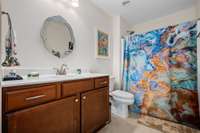 Full bath located upstairs in the bonus room.  Perfect for guests to have their own space, a teen or inlaw too!