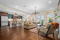 View from your open floorplan into the living room and kitchen are