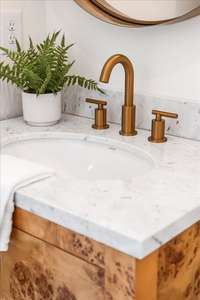 Beautiful Half Bath in the Main Level Hallway