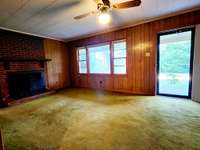Living room area with fireplace.