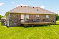 Enjoy outdoor living on the large deck, perfect for grilling, relaxing, or entertaining guests.
