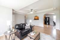 The living room flows easily into the kitchen and dining area, ideal for everyday living.