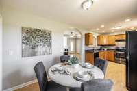 Conveniently located just off the kitchen, the dining area is perfect for everyday meals or casual entertaining.
