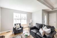Windows fill the space with natural light, creating a warm and welcoming atmosphere.