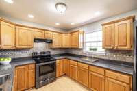 With plenty of space for meal prep and everyday use, this kitchen is the heart of the home.