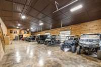 Climate controlled garage/bunk lodge close to the main lodge housing ATVS, Vintage Range Rovers,boats, are housed. Also 3 additional suites, kitchen, conference room, and another Owner Suite-office, storage, freezer room/ game cleaning room