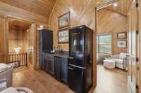 Upstairs bedroom in main lodge with kitchen