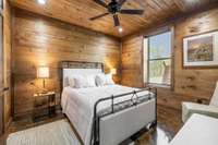 Bedroom 1 of 3 additional bedrooms in Garage/bunkhouse on main floor in back of building