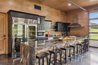 Main lodge full kitchen and relaxing area for guests