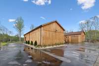 View of back of Main Lodge with all of the garage doors closed