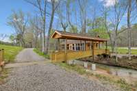 Covered Bridge Adjoining the Event Venue, Access road and Main Lodge