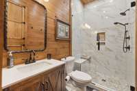 Main lodge bedroom 1 (of 2) in suite bathroom
