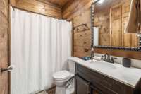 bathroom for Bedroom 1 in Garage/bunk house on main floor in back of building