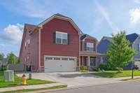 Additional parking on extended driveway is ideal for extra cars and guests