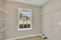 This home has a large laundry room!