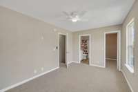 The primary suite has new carpet and new finishes in the bathroom.