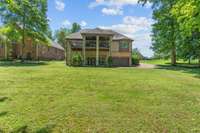 Rear of home. Look how large the backyard is.