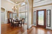 Lovely light-filled dining room and entry