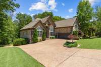 Lots of mature trees and beautiful landscaping.