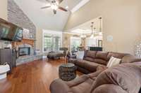 Large great room with stone fireplace