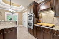 Cooktop, oven, microwave and plenty of counter space