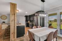 *OPEN KITCHEN WITH EXTRA ISLAND SEATING PLUS EXTRA CABINET STORAGE* IMAGINE BREAKFAST AND DINNER WITH A VIEW OF THE PASTURE!*