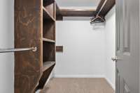 Large walk-in closet with built-in shelving