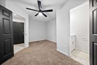 Second bedroom downstairs with half bath.