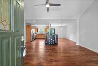 Open concept floor plan.  Hardwood floors in living area.
