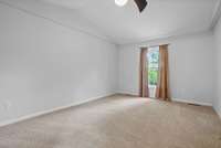 Primary Bedroom is large enough for a king size bed and a small sitting area