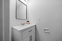 Half bath in second bedroom downstairs