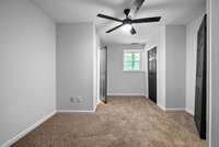 Second bedroom with closet and half bath