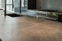 The kitchen includes Dekton countertops.