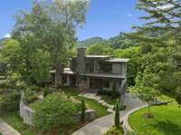 All of the mature trees provide the home with a lot of privacy.