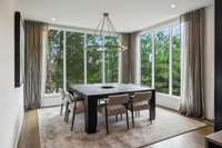 Custom Restoration Hardware curtains in the dining room, primary bedroom, and sunroom.