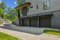 This extra deep 3-car garage allows for plenty of storage with the sealed walk-in crawl space, tankless hot water heater, and a whole house water filtration system.