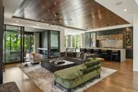 This open concept living room/kitchen/sunroom room is an entertainer's dream!