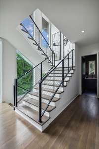 This home has a framed elevator shaft currently used as closets.