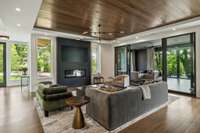 This home includes built-in speakers in the living room, kitchen, sunroom, primary bath, and gym.