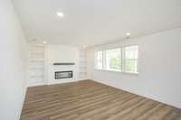 GREAT ROOM WITH FIREPLACE AND BUILT IN'S