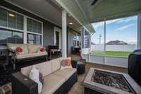 Lots of room for seating groups and tiered for watching movies or sports! Ceiling fan out here too!