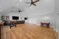 This over-sized bonus room is ideal for movie nights, entertaining and games.