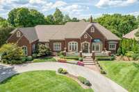 This beautifully designed masterpiece offers a unique layout with more than 7,000 square feet of living space on the main level alone and close to 2,000 more in the expansive upstairs bonus rooms and guest suite.