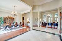 Pillars and deep crown molding reflect the elegance of the home.