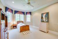 Bedroom #4 is also spacious with an ensuite bathroom. The bay windows have beautiful views of the estate's back yard. This room boasts a walk-in closet.