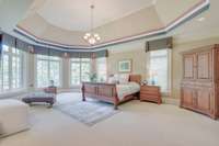 The large windows overlook the golf course, and offer automated blinds.