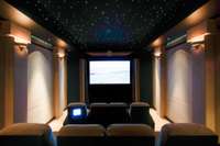 Unique star lights have been installed in the ceiling. This is truly the Rolls Royce of home theaters, with a THX level movie system.