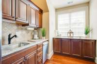 The second kitchen has a sink, refrigerator and oven. So much storage too!